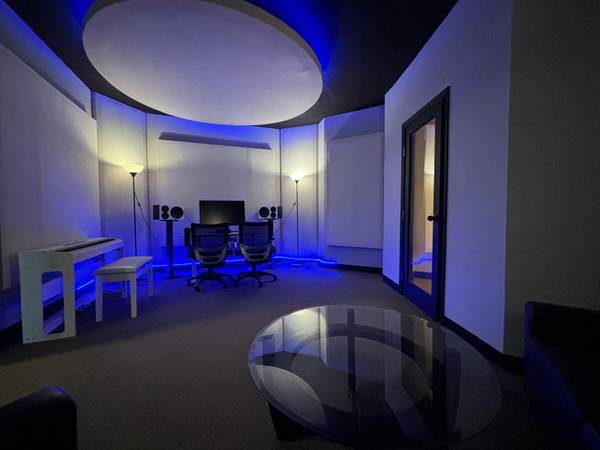Private music production suite with a circular ceiling cloud